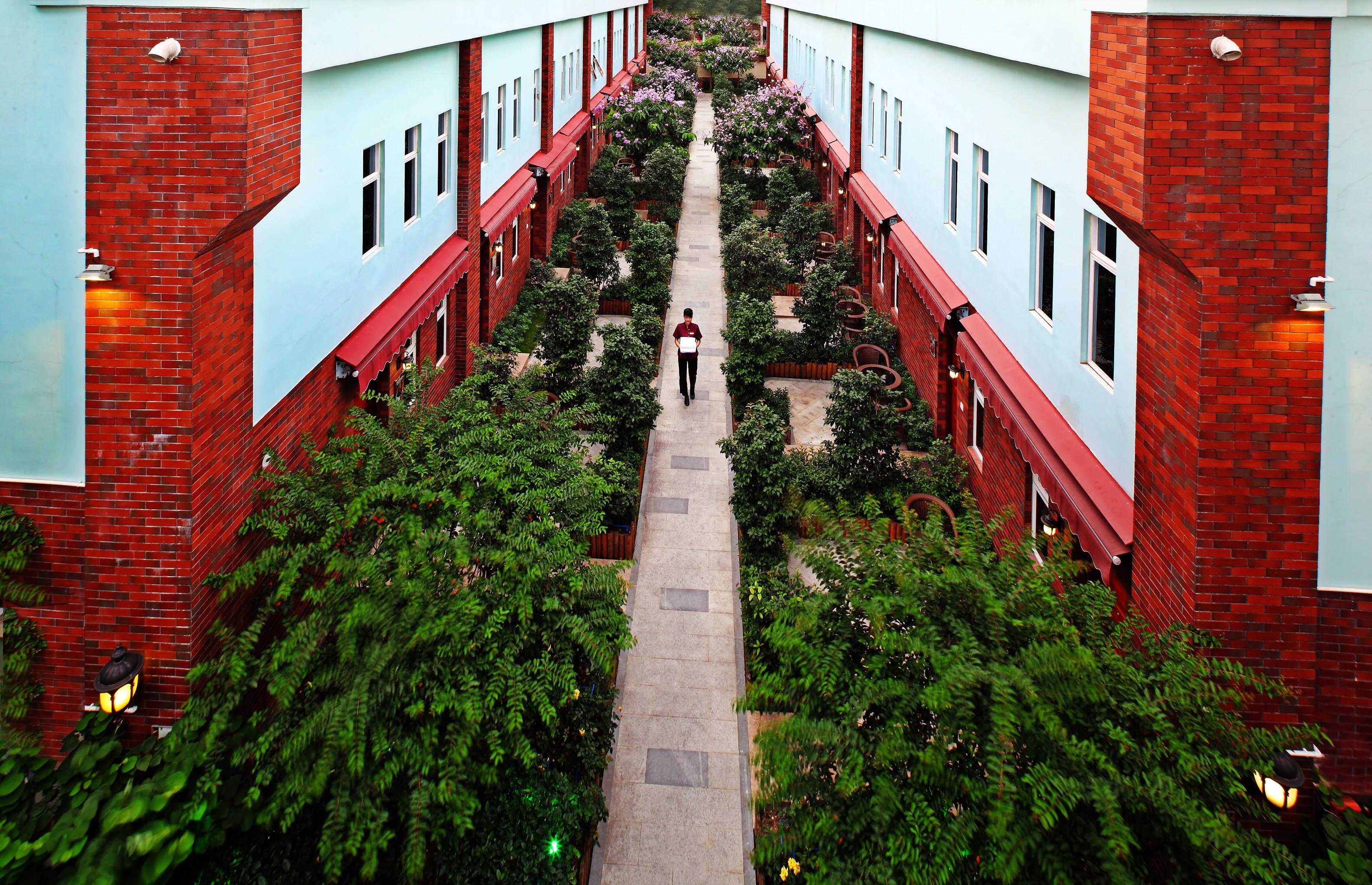 Royal Garden Hotel Canton Esterno foto